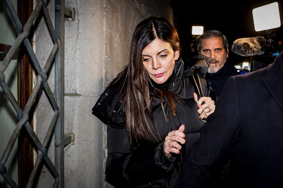 The owner of the bar in Crans-Montana, where the deadly fire happened on New Year's Day, Jessica Moretti from France, center, leaves with the lawyer Nicola Meier, after to be auditioned by the Va ...