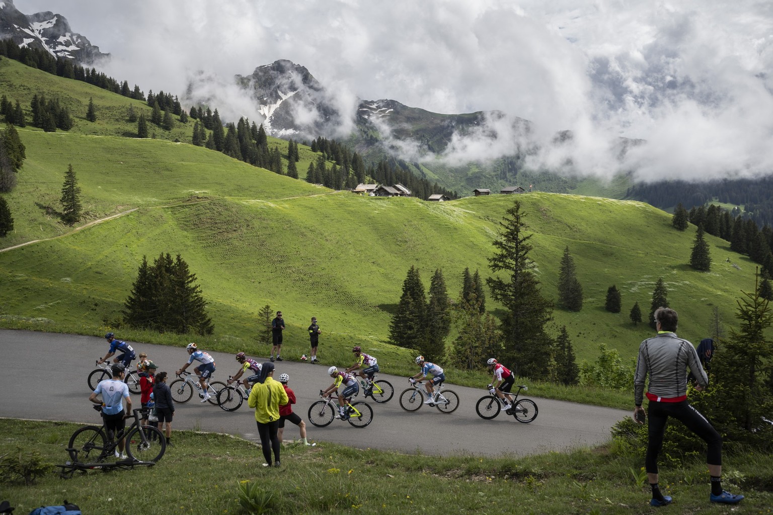 Riders climb the Col de la Croix pass during the seventh stage, a 118.1 km race in Villars-Sur-Ollon, at the 87th Tour de Suisse UCI World Tour cycling race, on Saturday, June 15, 2024. (KEYSTONE/Gian ...