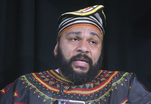 FILE - In this Saturday, Jan. 11, 2014 file photo, French comic Dieudonne M&#039;Bala M&#039;Bala speaks to the media during a press conference in a theater in Paris. The French comic whose gesture to ...