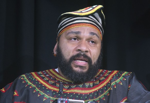 FILE - In this Saturday, Jan. 11, 2014 file photo, French comic Dieudonne M&#039;Bala M&#039;Bala speaks to the media during a press conference in a theater in Paris. The French comic whose gesture to ...
