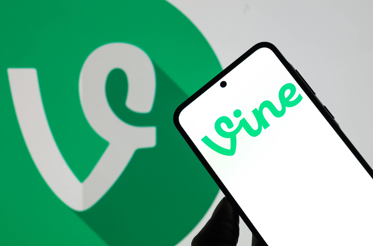 Vine - Photo Illustration The Vine logo is displayed on a mobile phone with the Vine icon seen in the background in this photo illustration in Brussels, Belgium, on September 1, 2025. Brussels Belgium ...