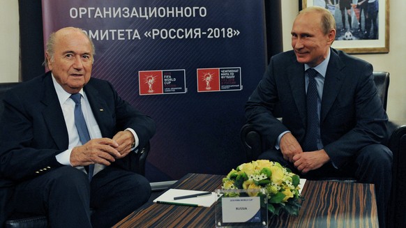 Russian President Vladimir Putin, right, and FIFA President Sepp Blatter meet in Moscow, Russia, Tuesday, Oct. 28, 2014. Putin and Blatter on Tuesday visited the Luzhniki Stadium which is under recons ...