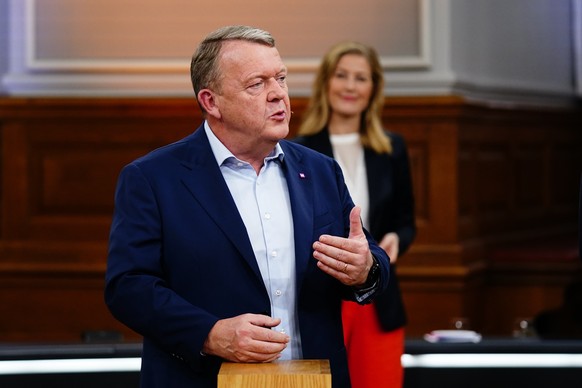 epa10277591 Leader of The Moderates Lars Loekke Rasmussen with leader of Danish Social Liberal Party Sofie Carsten Nielsen i back ground during the party leader debate in the Common Hall at Christians ...