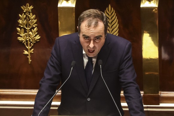 epa12453115 French Prime Minister Sebastien Lecornu delivers a general policy statement at the National Assembly in Paris, France, 14 October 2025. Lecornu announced his new government on 12 October,  ...