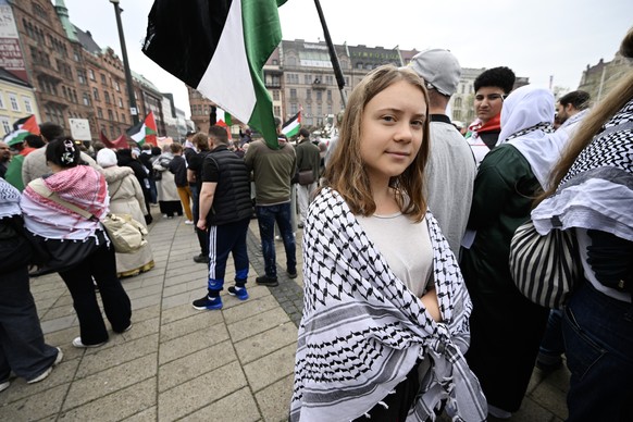 epa11329139 Climate activist Greta Thunberg attends the &#039;Stop Israel&#039; demonstration between Stortorget and Molleplatsen in Malmo, Sweden, 09 May 2024. Organizers expect thousands to particip ...