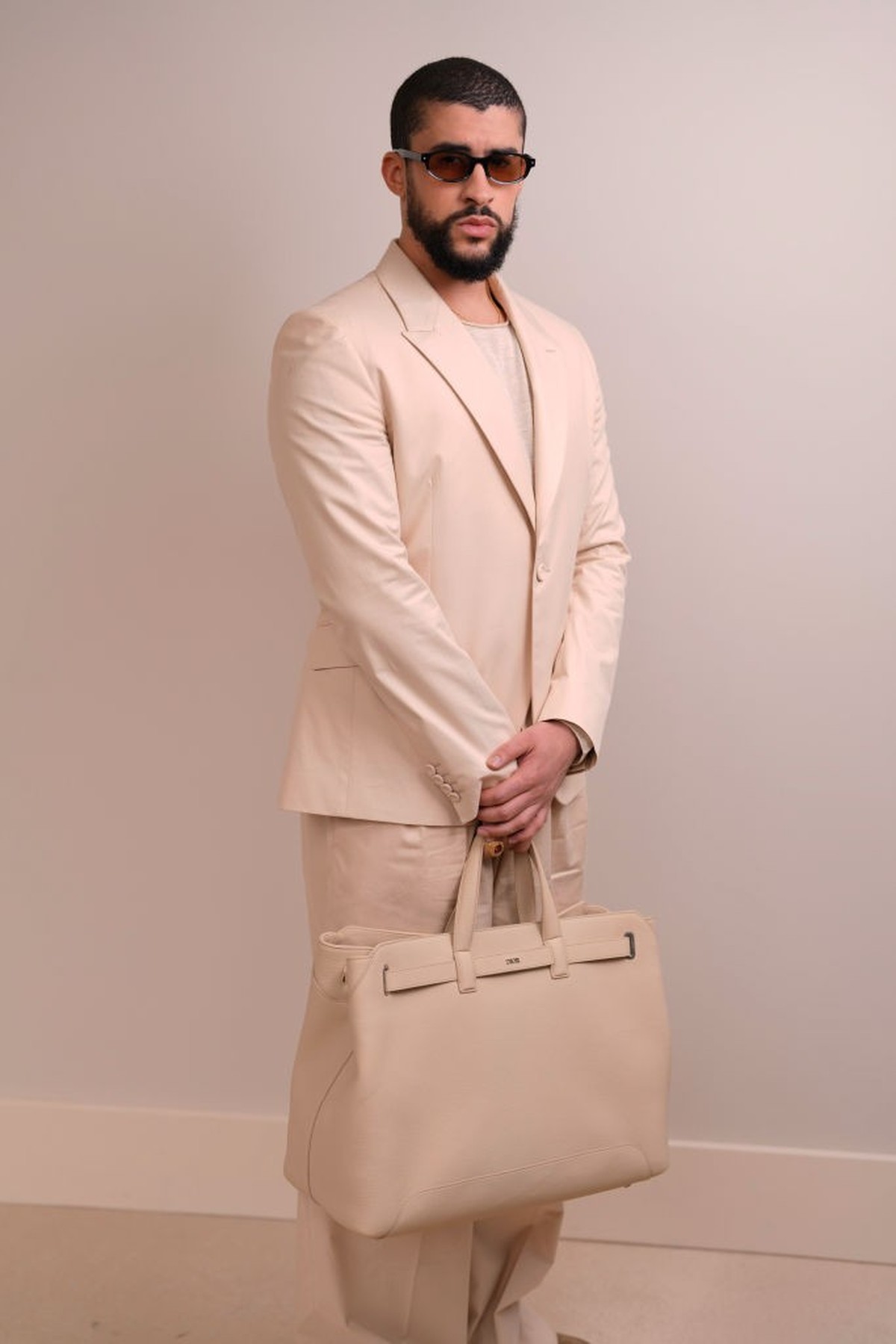 Bad Bunny at the Dior fashion show during Paris Fashion Week Menswear Spring/Summer 2025 held at Val de Grace on June 21, 2024 in Paris, France. (Photo by Swan Gallet/WWD via Getty Images)
