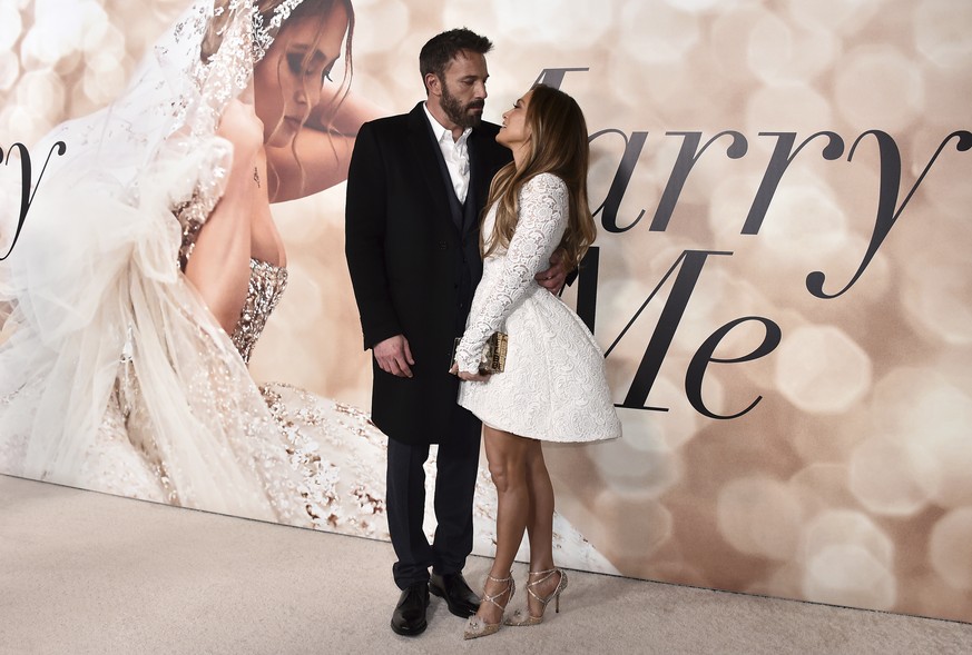 Cast member Jennifer Lopez, right, and Ben Affleck attend a photo call for a special screening of &quot;Marry Me&quot; at DGA Theater on Tuesday, Feb. 8, 2022, in Los Angeles. (Photo by Jordan Strauss ...
