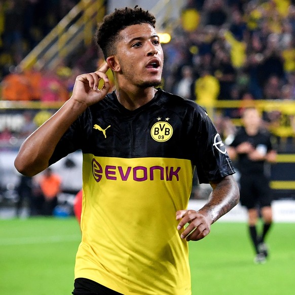 epa07755442 Dortmund's Jadon Sancho celebrates after scoring the 2-0 lead during the German Supercup soccer match between Borussia Dortmund and FC Bayern Muenchen in Dortmund, Germany, 03 August ...