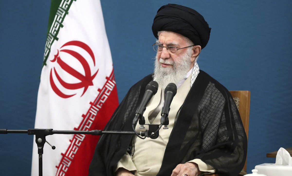 In this photo released by the official website of the office of the Iranian supreme leader, Supreme Leader Ayatollah Ali Khamenei attends a meeting with the President Masoud Pezeshkian's administ ...