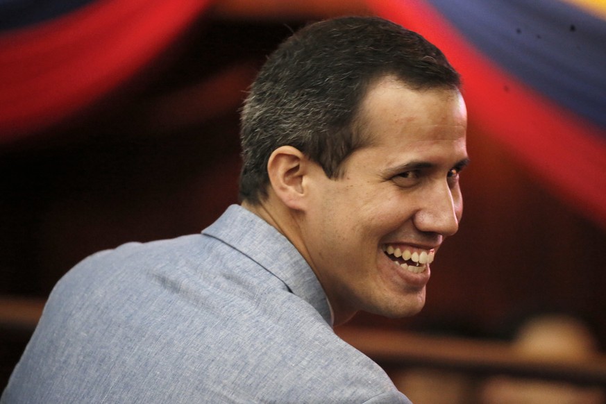 Venezuela&#039;s self proclaimed president Juan Guaido arrives for a meeting with university students at the Central University of Venezuela, in Caracas, Venezuela, Friday, Feb. 8, 2019. Guaido declar ...