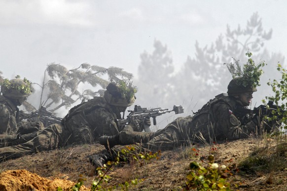 epa05361729 Polish soldiers during international military exercise Saber Strike in Adazi military training area, Latvia 13 June 2016. 
More than 2100 soldiers from the United States, Latvia, Lithuani ...