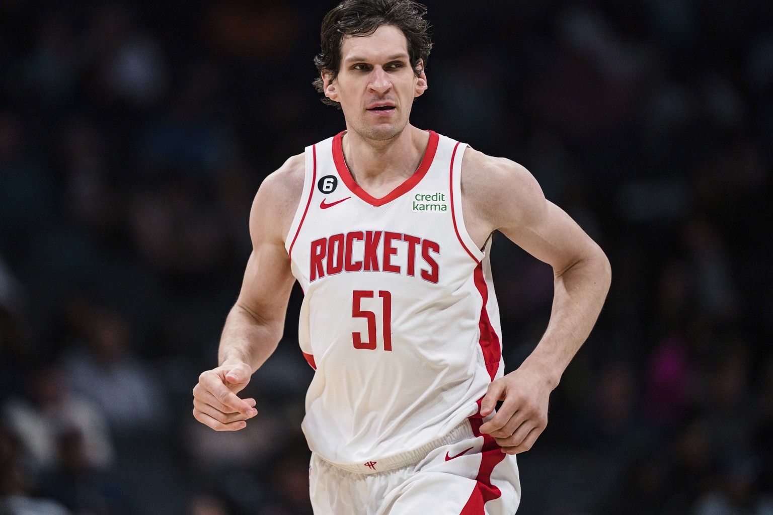 Houston Rockets center Boban Marjanovic looks on during the first half of an NBA basketball game against the Charlotte Hornets in Charlotte, N.C., Friday, April 7, 2023. (AP Photo/Jacob Kupferman)
