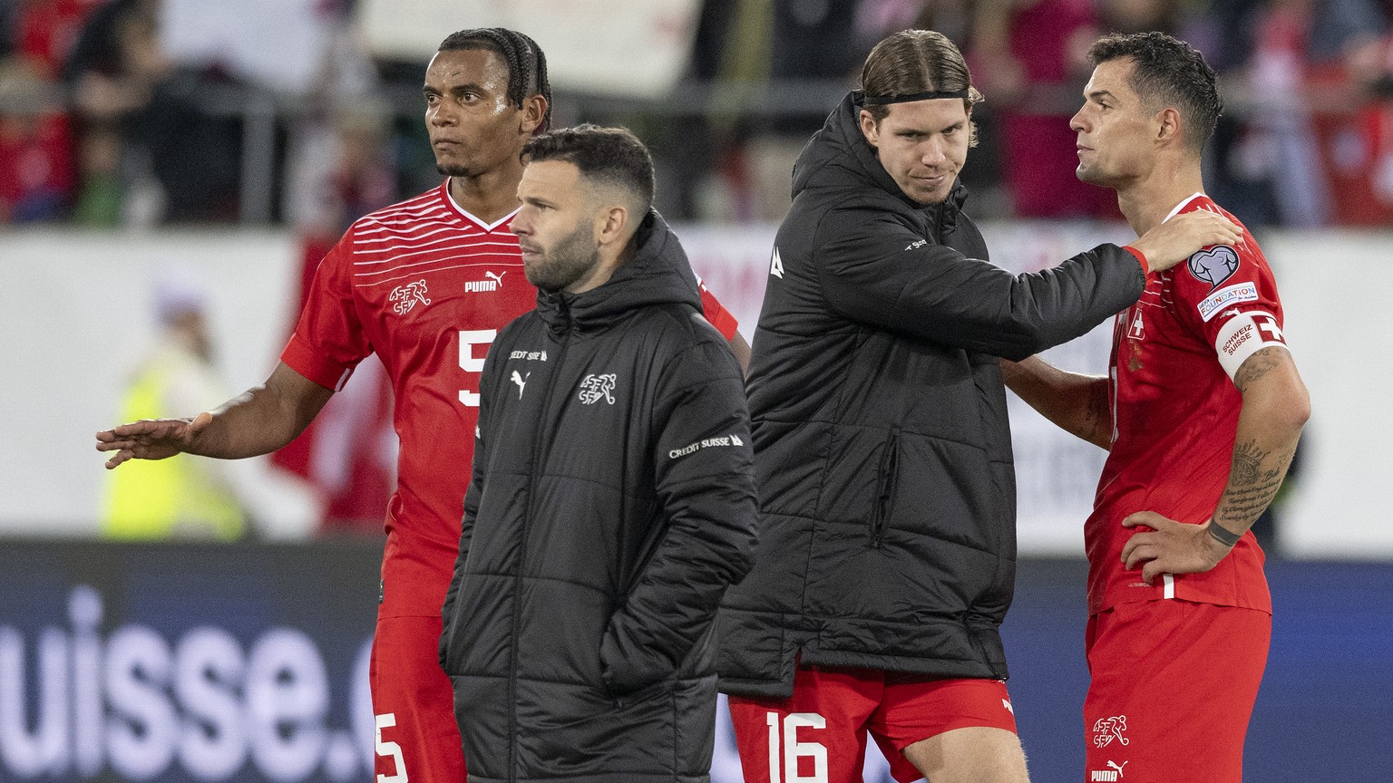 Switzerland&#039;s defender Manuel Akanji, midfielder Renato Steffen, forward Cedric Itten and midfielder Granit Xhaka, from left, ract during the UEFA Euro 2024 qualifying group I soccer match betwee ...