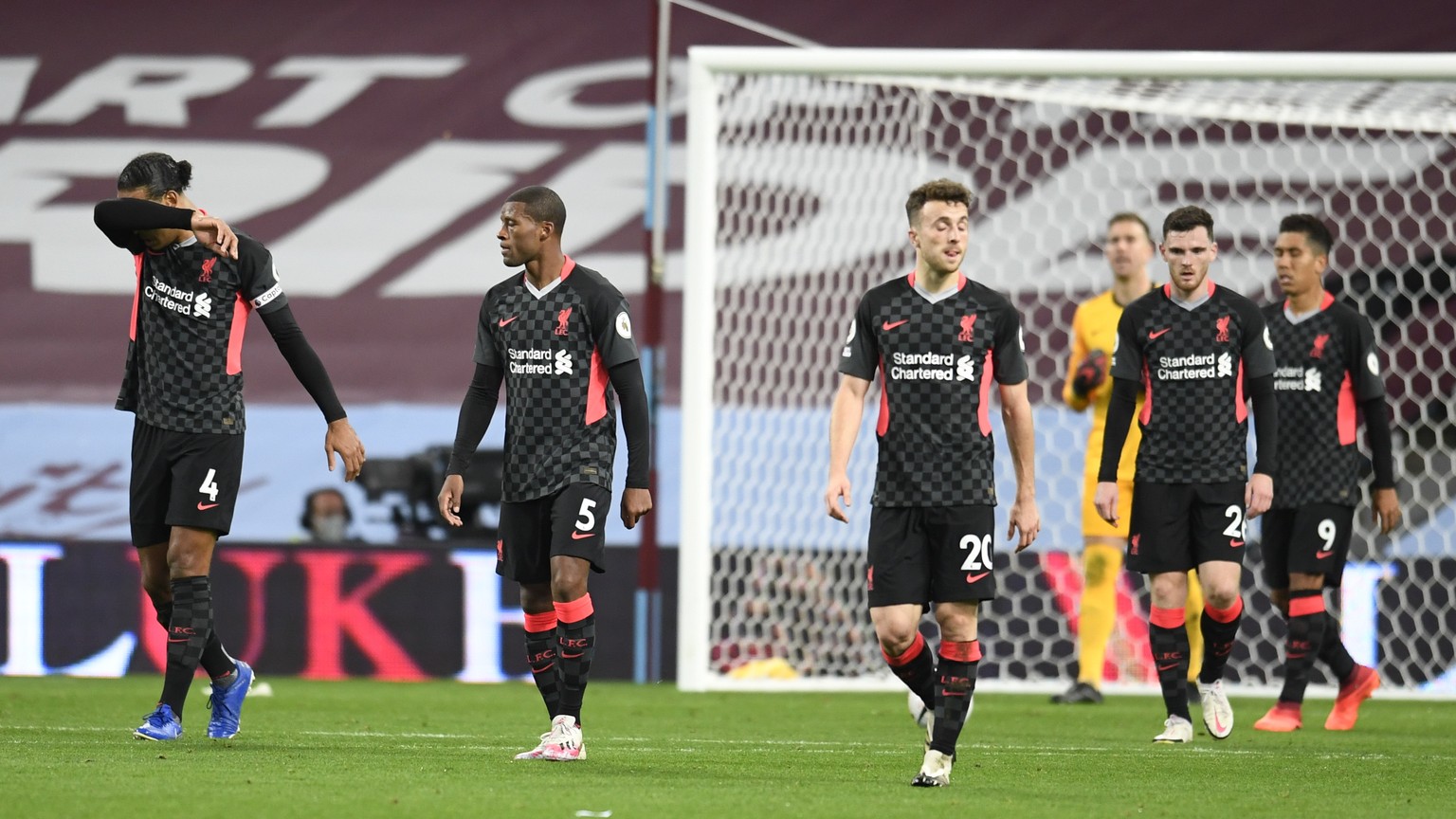 epa08721035 Liverpool player react during the English Premier League match between Aston Villa and Liverpool in Birmingham, Britain, 04 October 2020. EPA/Peter Powell / Pool EDITORIAL USE ONLY. No use ...