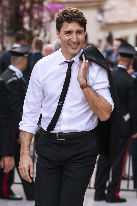 Canadian Prime Minister Justin Trudeau arrives for a concert in the Ancient Theatre of Taormina ( 3rd century BC) in the Sicilian citadel of Taormina, Italy, Friday, May 26, 2017. Leaders of the G7 me ...