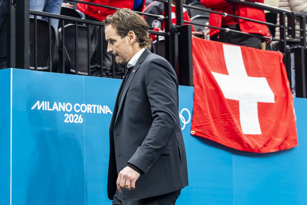 Patrick Fischer, head coach of Switzerland national ice hockey team, looks disappointed as they leave his bench after the second period, during the men's group A preliminary round game between Ca ...
