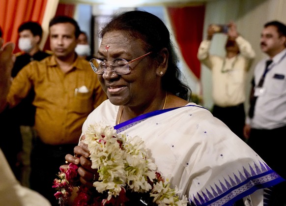 India&#039;s newly elected president Droupadi Murmu greets the crowd gathered at her temporary residence in New Delhi, India, Thursday, July 21, 2022. Murmu, a leader from India&#039;s ruling Bharatiy ...