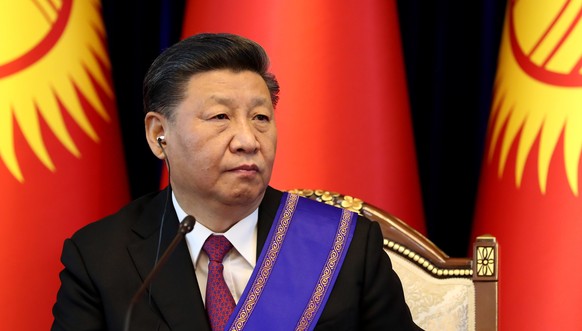 epa07644842 China&#039;s President Xi Jinping during a press conference with Kyrgyz President Sooronbay Jeenbekov (not seen) following a meeting in Bishkek, Kyrgyzstan, 13 June 2019. Xi Jinping is on  ...