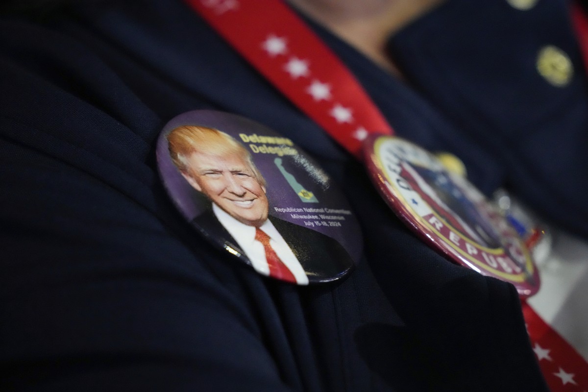 A Delaware delegate wears badges at the Republican National Convention Monday, July 15, 2024, in Milwaukee. (AP Photo/Nam Y. Huh)