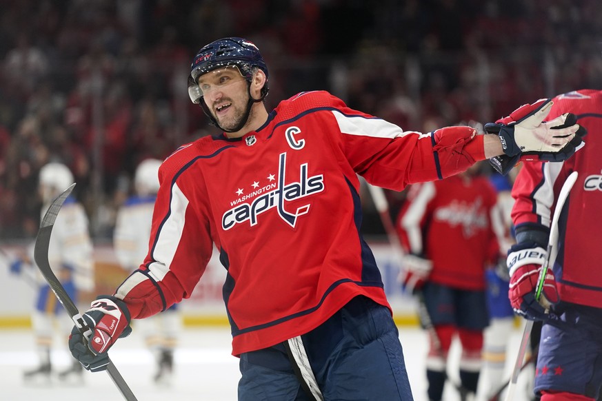 Washington Capitals left wing Alex Ovechkin celebrates after teammate Tom Wilson scored a goal in the third period of an NHL hockey game against the Buffalo Sabres, Monday, Nov. 8, 2021, in Washington ...
