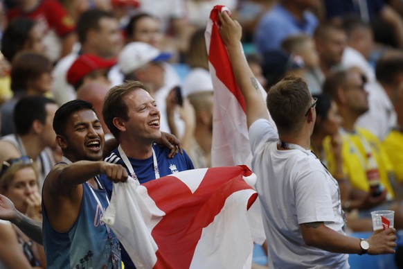 England fans celebrate during the quarterfinal match between Sweden and England at the 2018 soccer World Cup in the Samara Arena, in Samara, Russia, Saturday, July 7, 2018. (AP Photo/Francisco Seco)