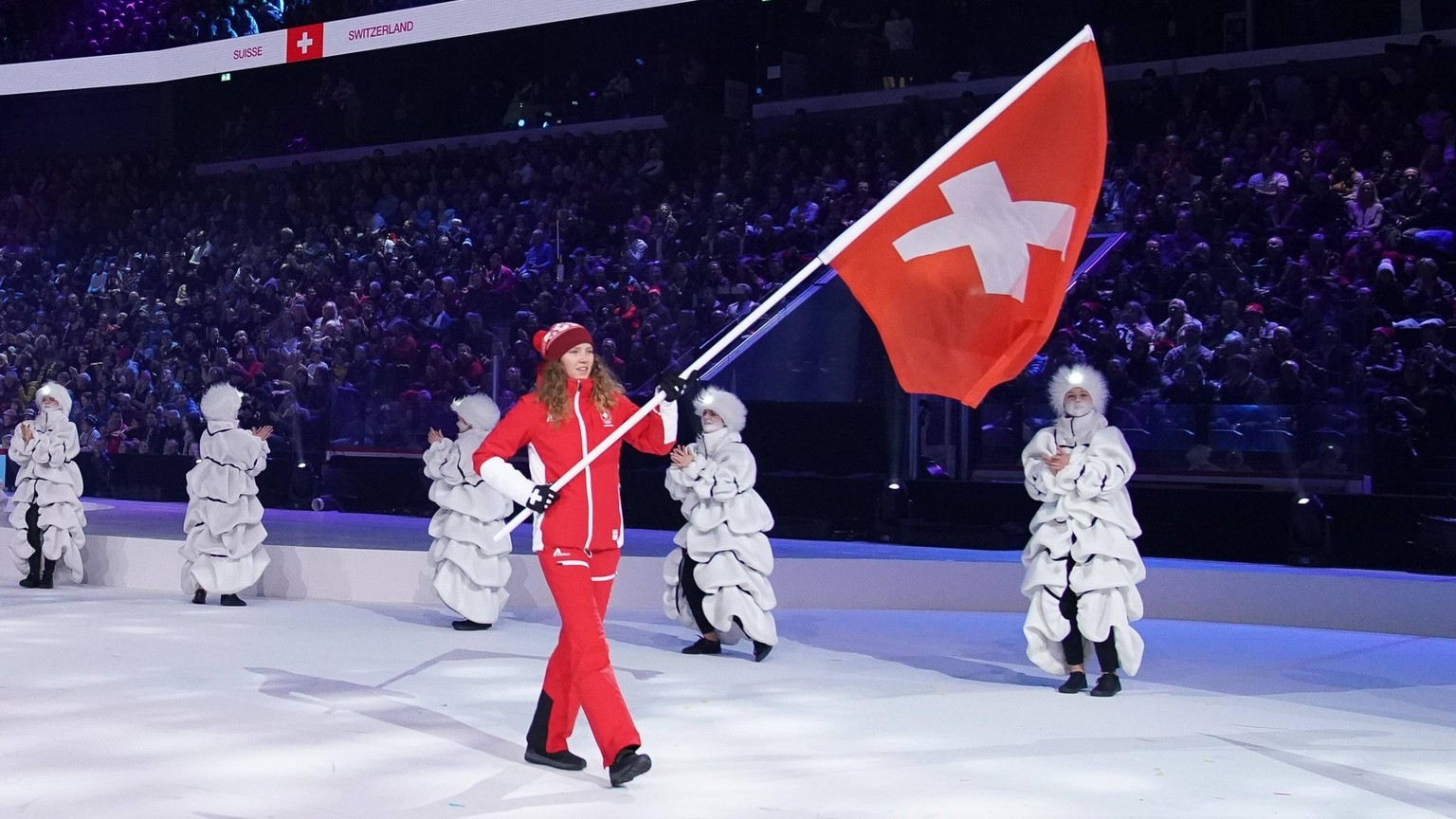 Olympics: Youth Olympic Winter games, Winterspiele,Spiele, Summer games Jan 9, 2020 Lausanne, SWITZERLAND Thibe Deseyn SUI, the flag bearer for Switzerland SUI arriving during the Parade of NOC flags  ...