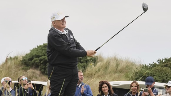 United States President Donald Trump tees off during the opening ceremony for the Trump International Golf Links golf course, near Aberdeen, Scotland, July 29, 2025. (AP Photo/Jacquelyn Martin, File)
 ...