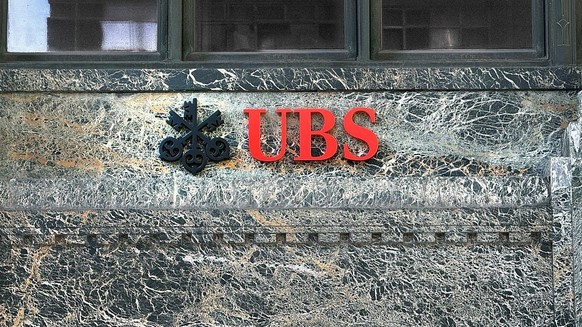 UBS Group AB, office building exterior with company logo and sign, New York City, New York, USA. (Photo by: Plexi Images/GHI/UCG/Universal Images Group via Getty Images)