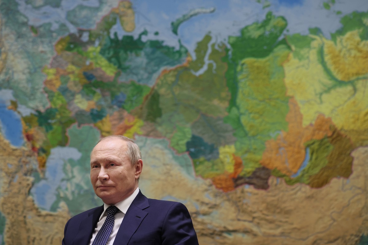 Russian President Vladimir Putin speaks during interview with the Russia-1 TV channel in the Bocharov Ruchei residence in the Black Sea resort of Sochi, Russia, Friday, June 3, 2022. Putin on Friday b ...