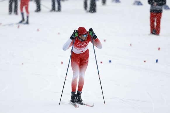 Dario Cologna of Switzerland after the men's cross-country skiing classic/free 4 x 10km relay at the 2022 Winter Olympics in Zhangjiakou, China, on Sunday, Feb. 13, 2022. (KEYSTONE/Peter Klaunzer)..