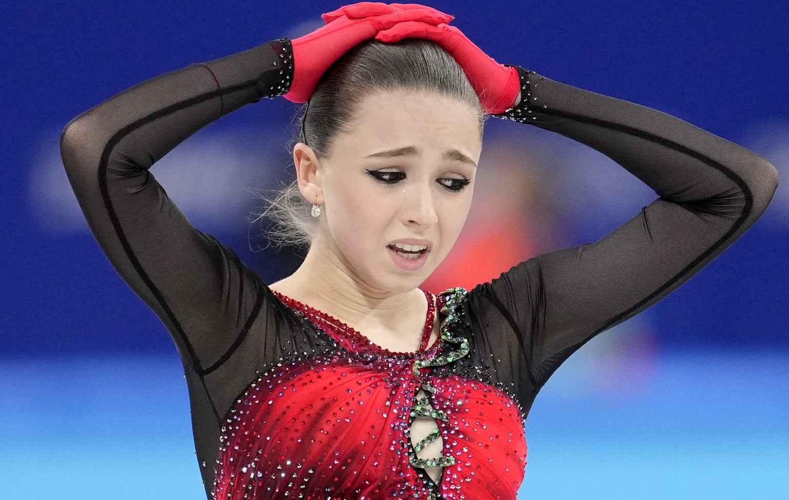 Kamila Valieva, 15, of the Russian Olympic Committee, reacts after the women&#039;s team free skate program during the figure skating competition at the 2022 Winter Olympics, Monday, Feb. 7, 2022, in  ...