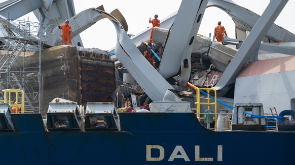epaselect epa11311234 Crews work to remove the wreckage of the Francis Scott Key Bridge atop the cargo vessel Dali in the Patapsco River as cleanup work continues to deconstruct and take away debris,  ...