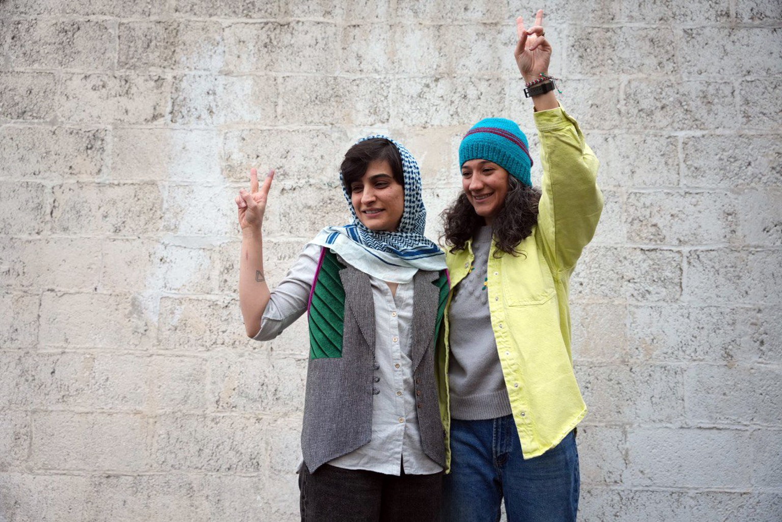 epa11076186 A handout photo made available by the Shargh News Daily online shows Iranian journalists Niloufar Hamedi (R) and Elaheh Mohammadi (L) after being released from prison in Tehran, Iran, 14 J ...