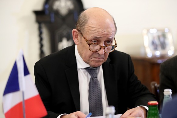 epa07293879 French Foreign Minister Jean-Yves Le Drian sits for a bilateral with Malta&#039;s Foreign Minister (not pictured) during the 15th Meeting of the ministers of Foreign Affairs of the 5+5 Wes ...