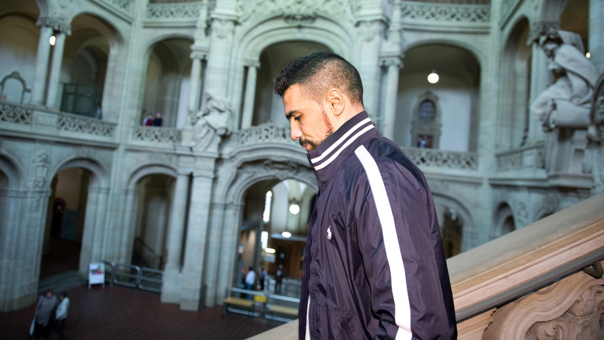 epa04090539 German rapper Bushido leaves the courtroom after his trial in Berlin, Germany, 20 February 2014. The 35 year old is on trial at the Tiergarten Regional Court in Berlin for dangerous bodily ...