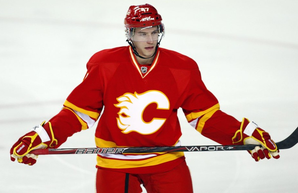 Calgary Flames' Sven Baertschi, from Switzerland, waits for a face off during first-period NHL hockey game action against the Winnepeg Jets in Calgary, Alberta, Friday, March 9, 2012. (AP Photo/T ...