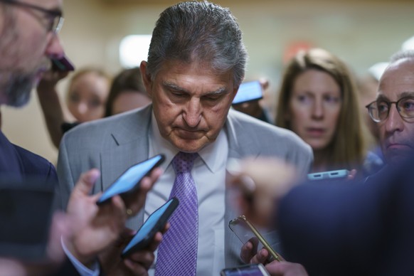 Sen. Joe Manchin, D-W.Va., a key negotiator in the infrastructure talks, speaks to reporters as senators arrive for votes at the Capitol in Washington, Tuesday, July 13, 2021. Yesterday, Sen. Bernie S ...