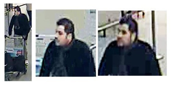epa05226545 A handout image provided by Belgian Federal Police shows a CCTV grab of one of the three suspects in the Zaventem airport attack in Brussels, Belgium, 22 March 2016. A surveillance camera  ...