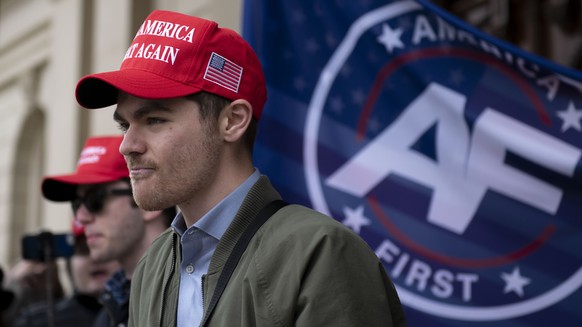 FILE - Nick Fuentes, far-right activist, holds a rally at the Lansing Capitol, in Lansing, Mich., Nov. 11, 2020. Former President Donald Trump had dinner Tuesday, Nov. 22, 2022, at his Mar-a-Lago club ...