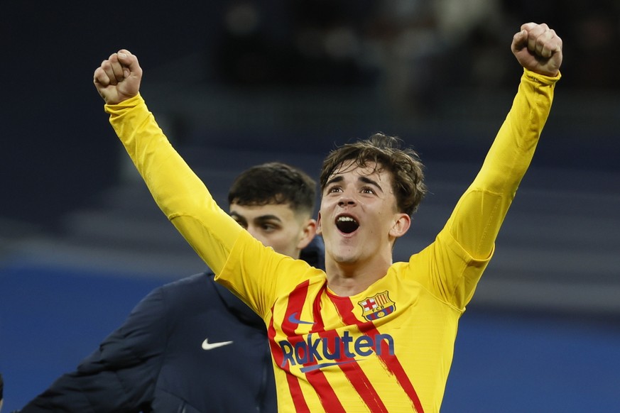 epa09839611 FC Barcelona&#039;s Gavi celebrates after winning &#039;El Clasico&#039;, the Spanish LaLiga soccer match between Real Madrid and FC Barcelona in Madrid, Spain, 20 March 2022. EPA/Balleste ...