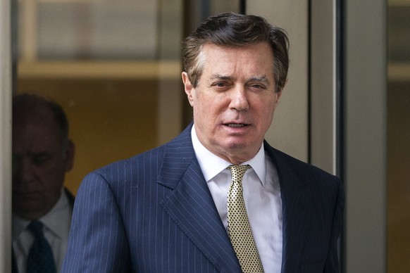 epa06679937 Paul Manafort, former campaign manager for US President Donald J. Trump, leaves the DC federal courthouse after asking the court to dismiss charges brought by special counsel Robert Muelle ...