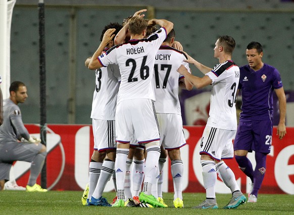 Basel&#039;s players celebrate after Birkir Bjarnason scored the 1-1 equalizer during an Europa League between Fiorentina and Basel at the Artemio Franchi stadium in Florence, Italy, Thursday, Sept. 1 ...