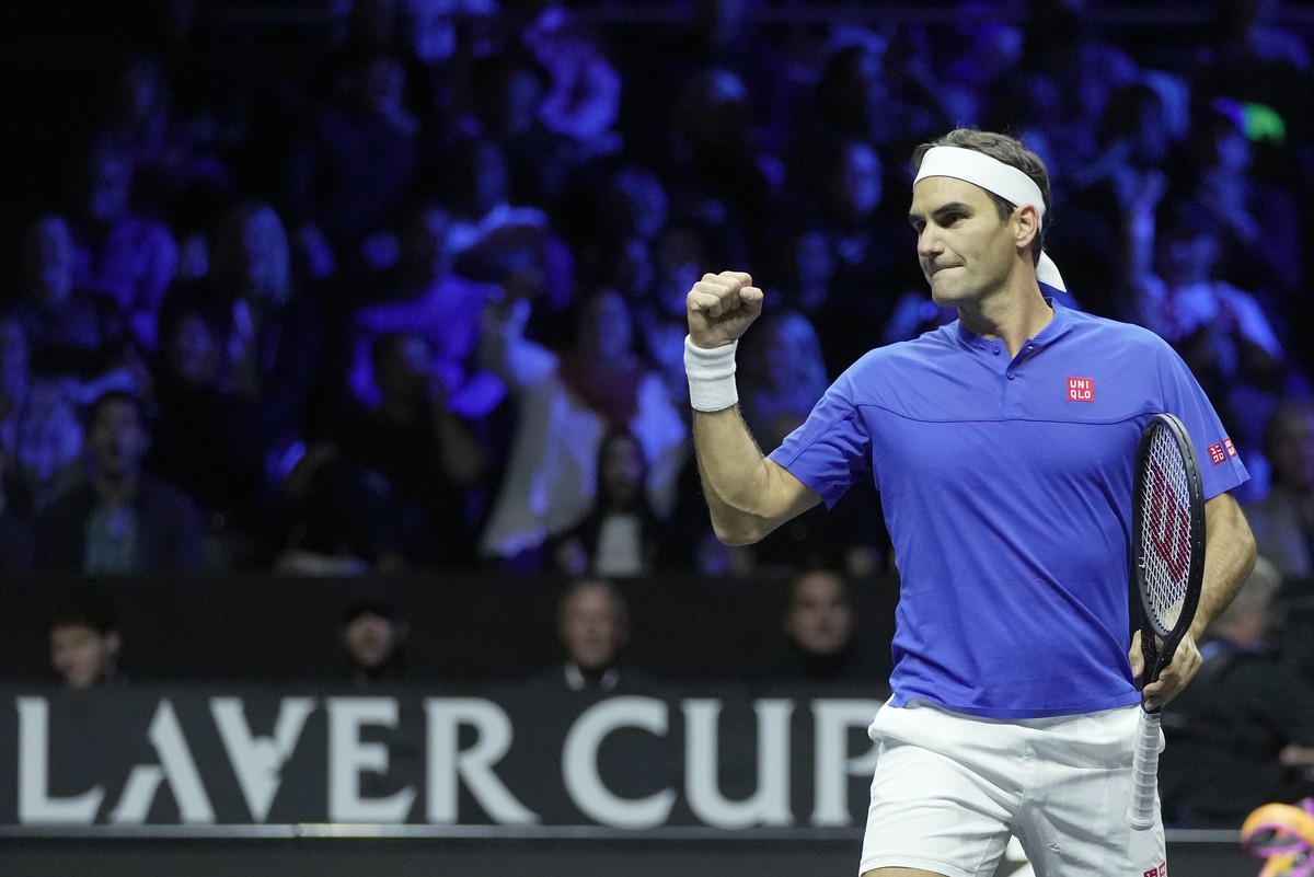 Team Europe's Roger Federer playing with Rafael Nadal reacts after winning a point during their Laver Cup doubles match against Team World's Jack Sock and Frances Tiafoe at the O2 arena in L ...