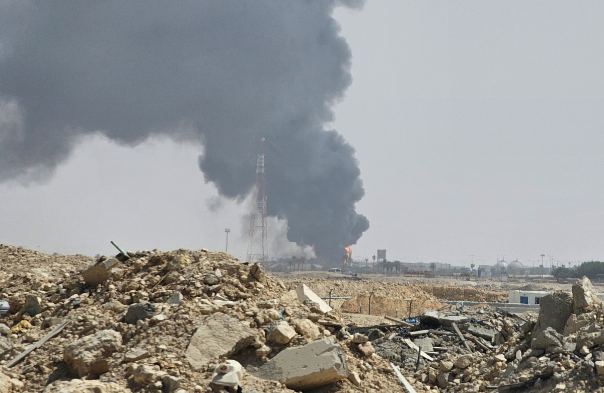 Black smoke and flames rise from an oil facility in an industrial area in southern Riyadh, Saudi Arabia, Saturday, Oct. 3, 2026. (AP Photo)
Mideast Wars Saudi