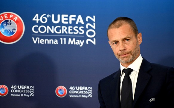 epa09939703 UEFA president Aleksander Ceferin arrives for the press conferences following the 46th Ordinary UEFA Congress in Vienna, Austria, 11 May 2022. The UEFA Executive Committee on 10 May approv ...