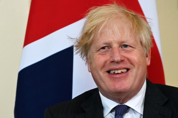 epa09278840 British Prime Minister Boris Johnson during a meeting with the Crown Prince of Bahrain at 10 Downing Street in London, Britain, 17 June 2021. EPA/ANDY RAIN / POOL