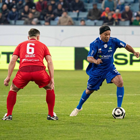 Lucerne, Switzerland, November 9th 2025 Ronaldinho Brazil in action during the Jogo Dos Famosos match between Ronaldinho and Friends and Swiss Legends at Swissporarena, Lucerne, Switzerland. Priscila  ...