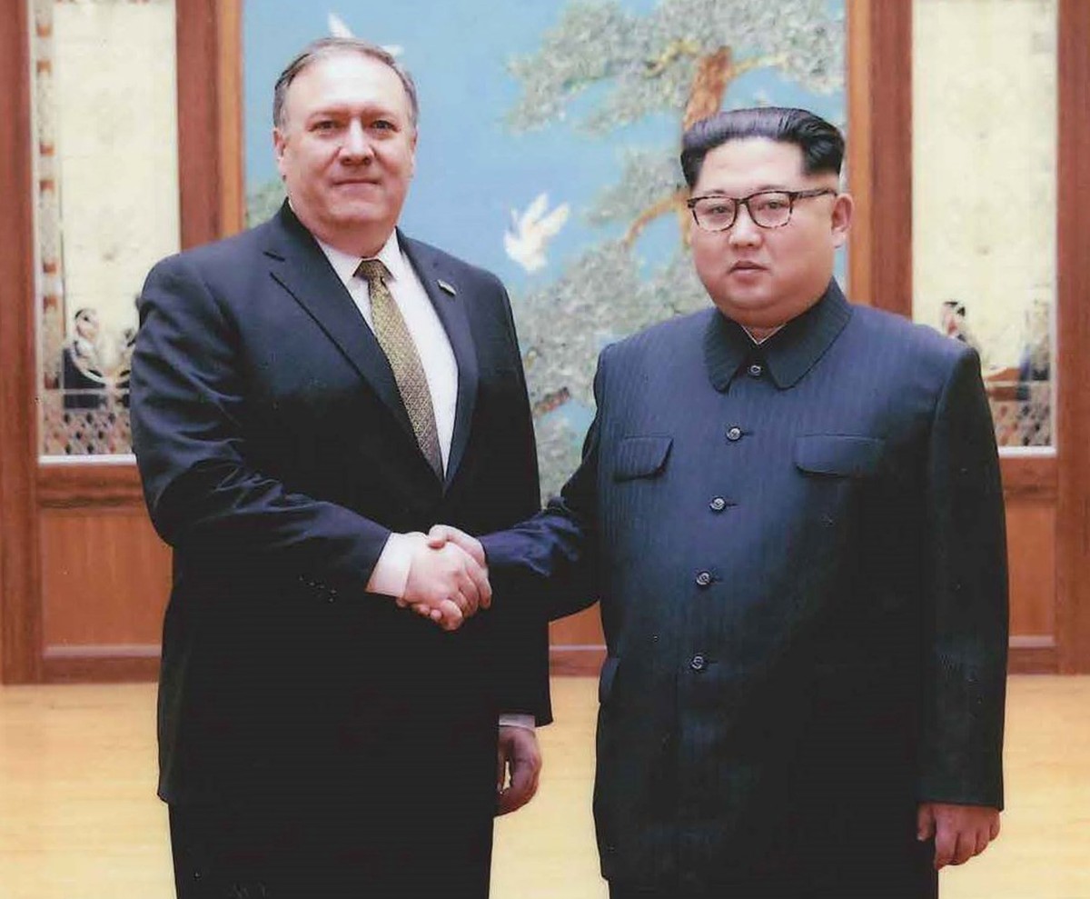 epa06720964 (FILE) - An undated handout photo made available by the US White House on 26 April 2018 shows then-CIA director Mike Pompeo (L) meeting with North Korean leader Kim Jong Un in, Pyongyang,  ...