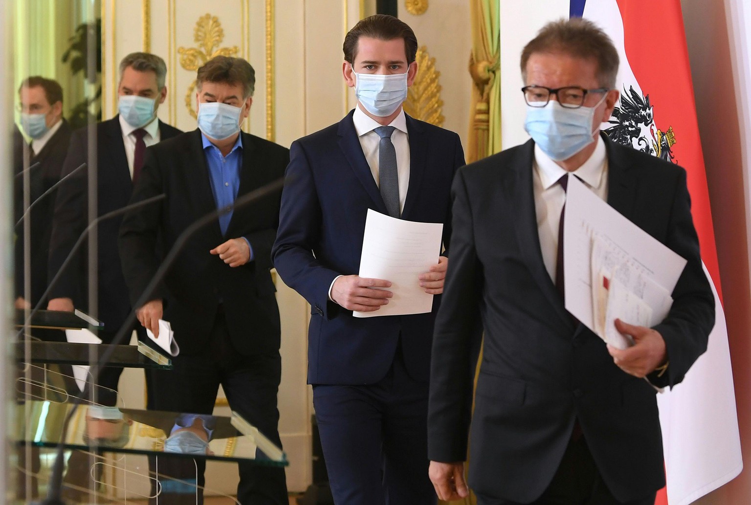 epa08345467 (L-R) Austrian Interior Minister Karl Nehammer, Austrian Vice-Chancellor Werner Kogler, Austrian Chancellor Sebastian Kurz and Austrian Minister for Social Affairs, Health, Care and Consum ...