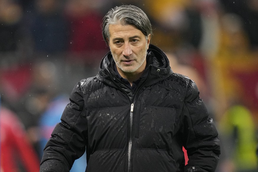 Switzerland&#039;s coach Murat Yakin leaves the pitch after the Euro 2024, group I, qualifying soccer match between Romania and Switzerland at the National Arena stadium in Bucharest, Romania, Tuesday ...
